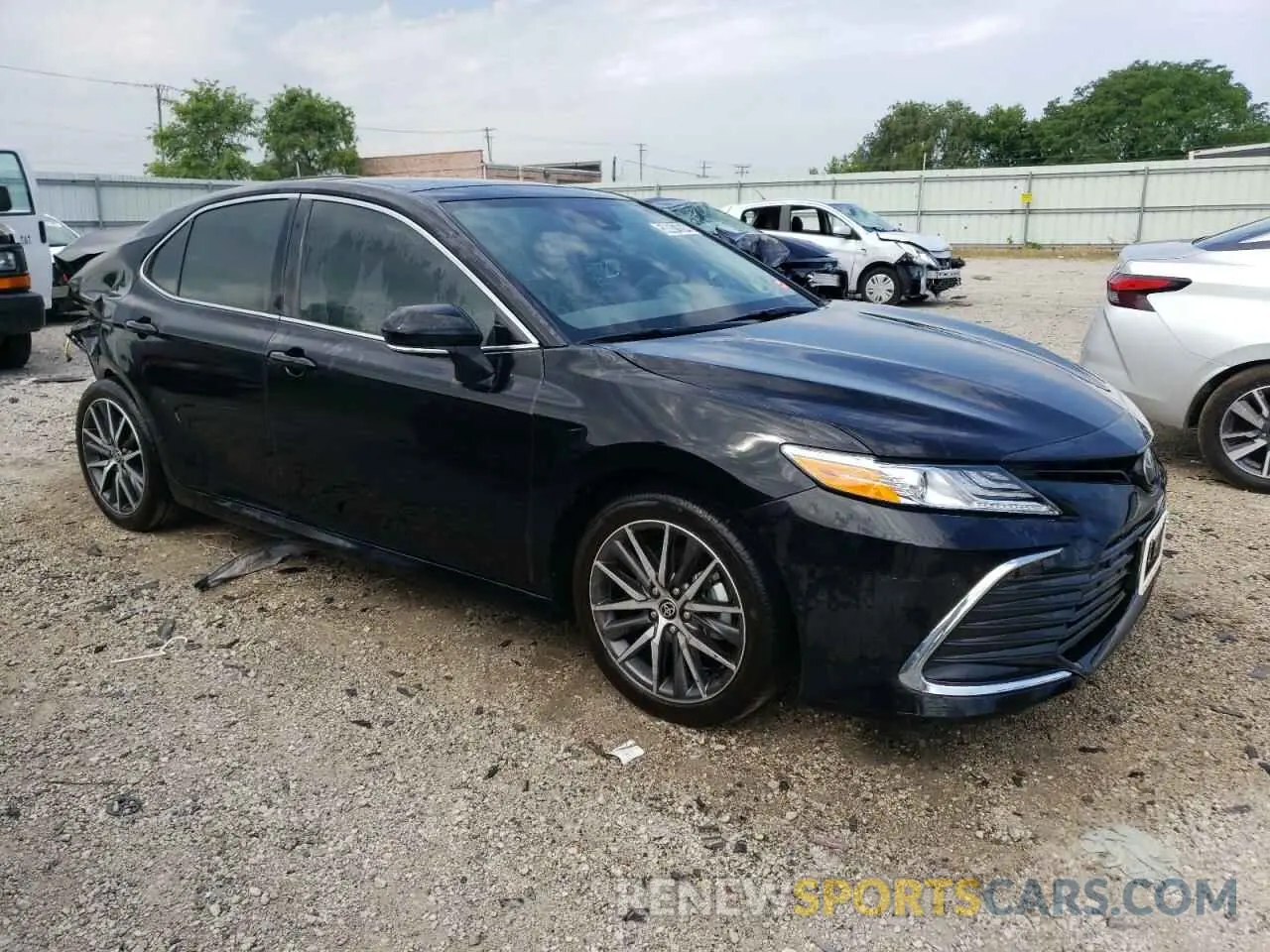 4 Photograph of a damaged car 4T1F11BK2PU100577 TOYOTA CAMRY 2023
