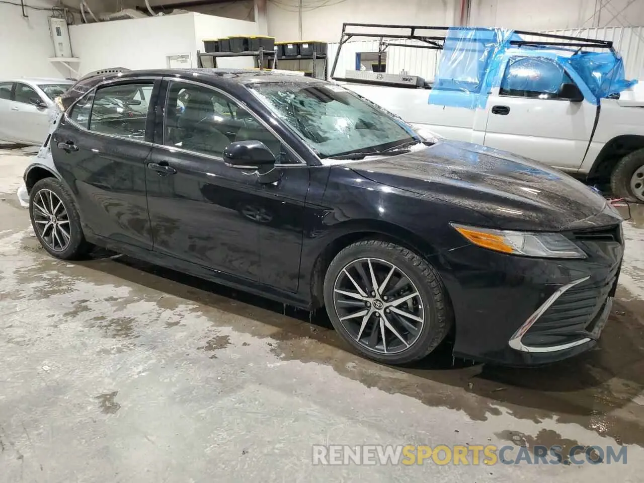 4 Photograph of a damaged car 4T1F11BKXPU102237 TOYOTA CAMRY 2023