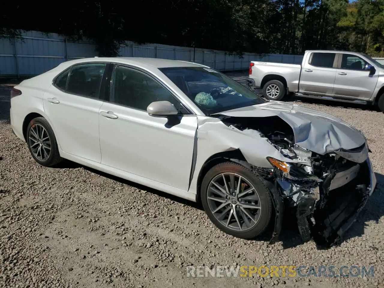 4 Photograph of a damaged car 4T1F31AK9PU604524 TOYOTA CAMRY 2023