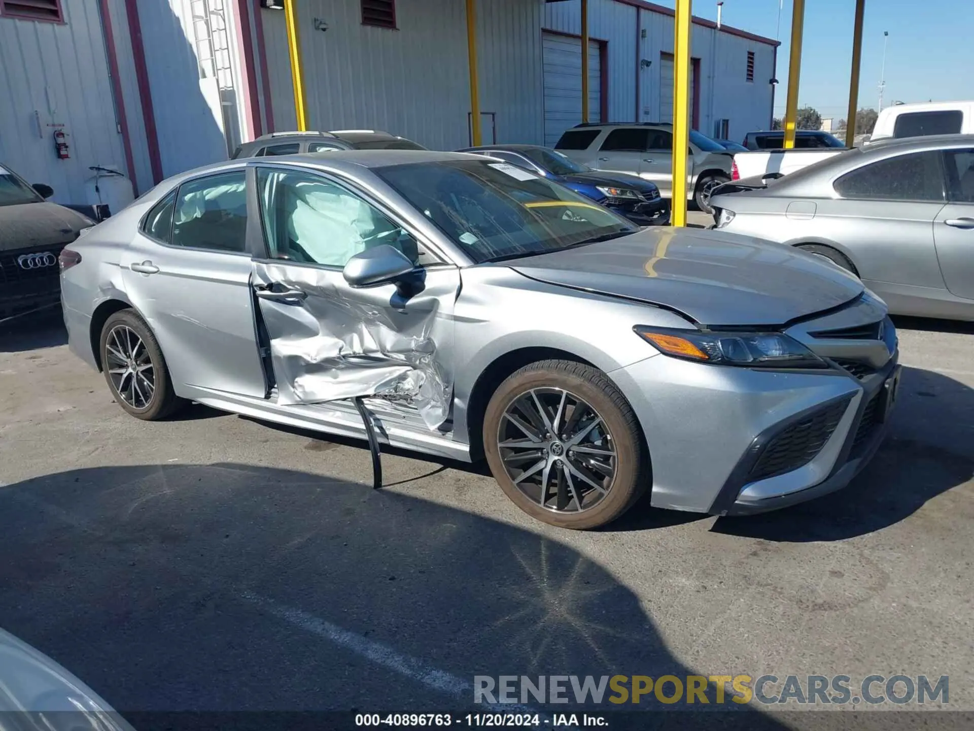 13 Photograph of a damaged car 4T1G11AK2PU740245 TOYOTA CAMRY 2023