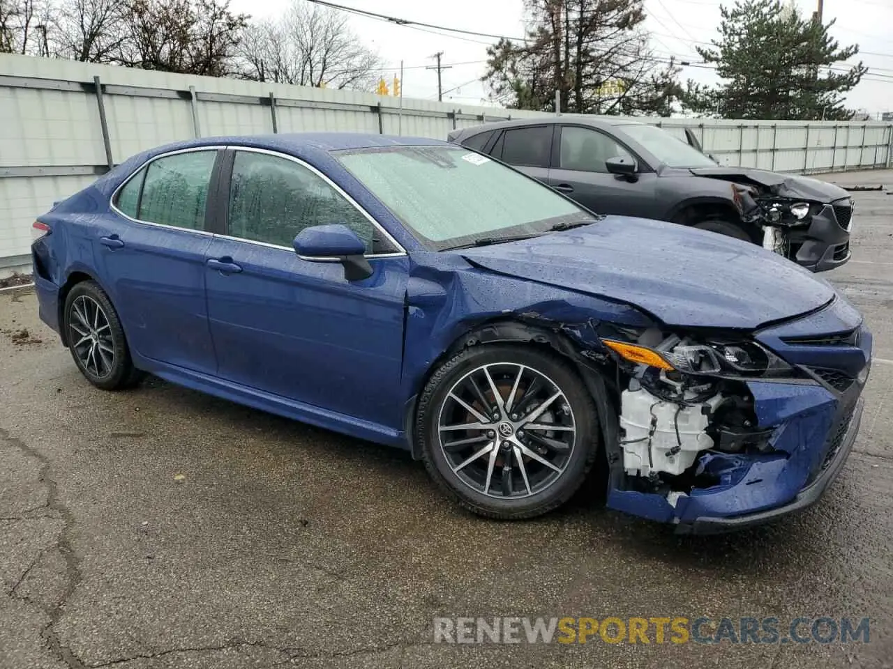 4 Photograph of a damaged car 4T1G11AK3PU131181 TOYOTA CAMRY 2023