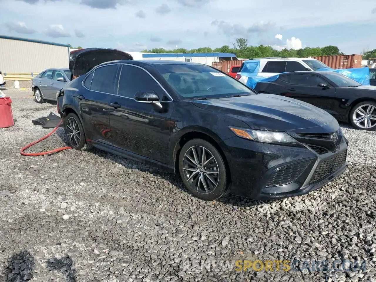 4 Photograph of a damaged car 4T1G11AK3PU768314 TOYOTA CAMRY 2023