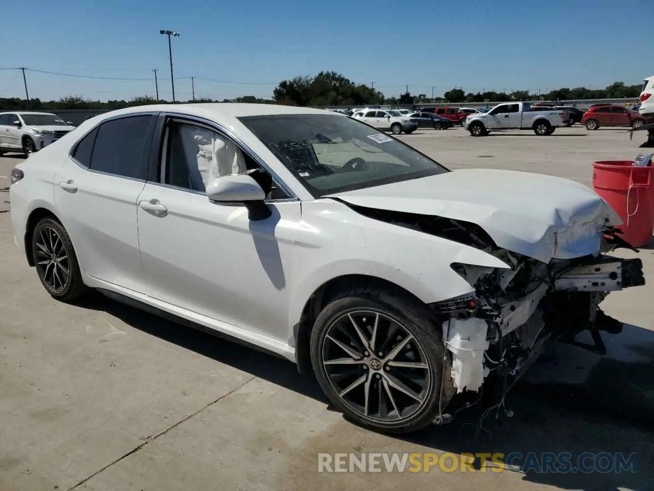 4 Photograph of a damaged car 4T1G11AK9PU721627 TOYOTA CAMRY 2023