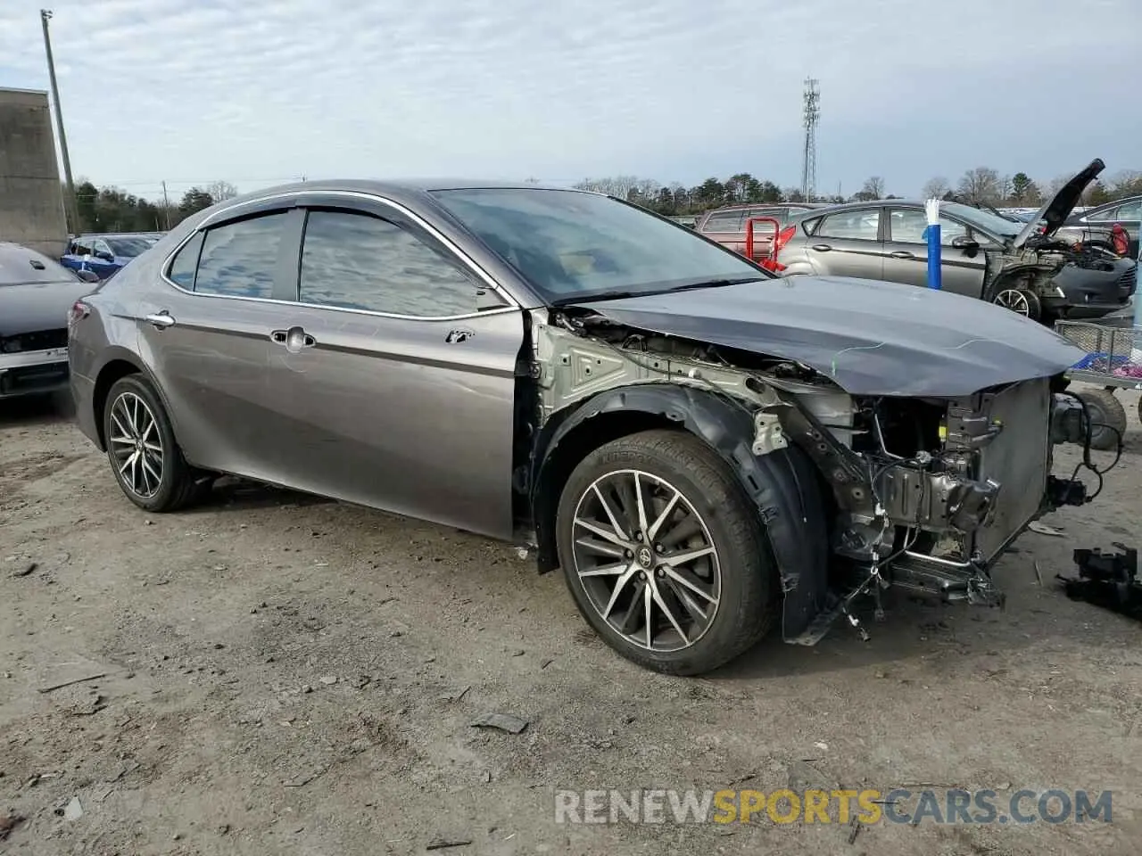 4 Photograph of a damaged car 4T1G11AK9PU733356 TOYOTA CAMRY 2023