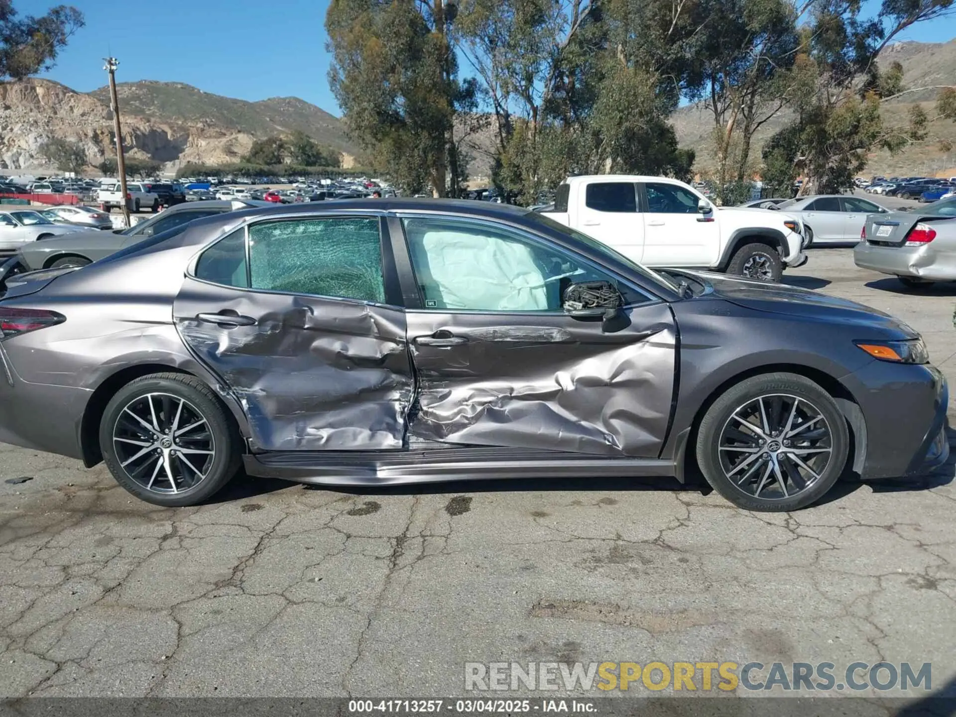 13 Photograph of a damaged car 4T1G11AKXPU791069 TOYOTA CAMRY 2023
