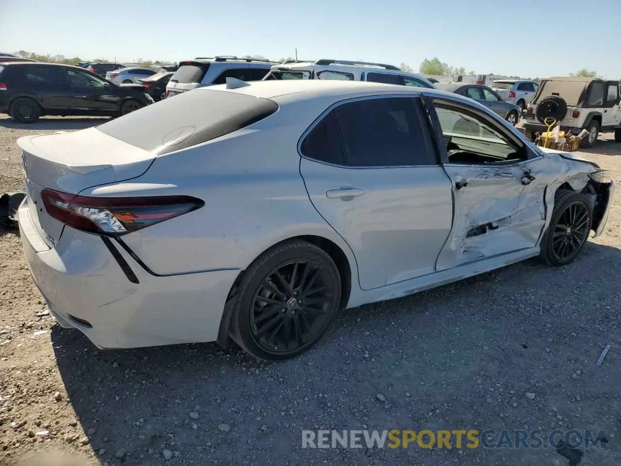 3 Photograph of a damaged car 4T1K31AK4PU058830 TOYOTA CAMRY 2023