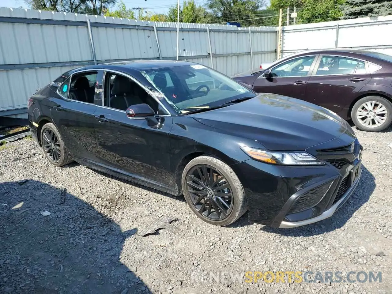 4 Photograph of a damaged car 4T1K31AK6PU609825 TOYOTA CAMRY 2023