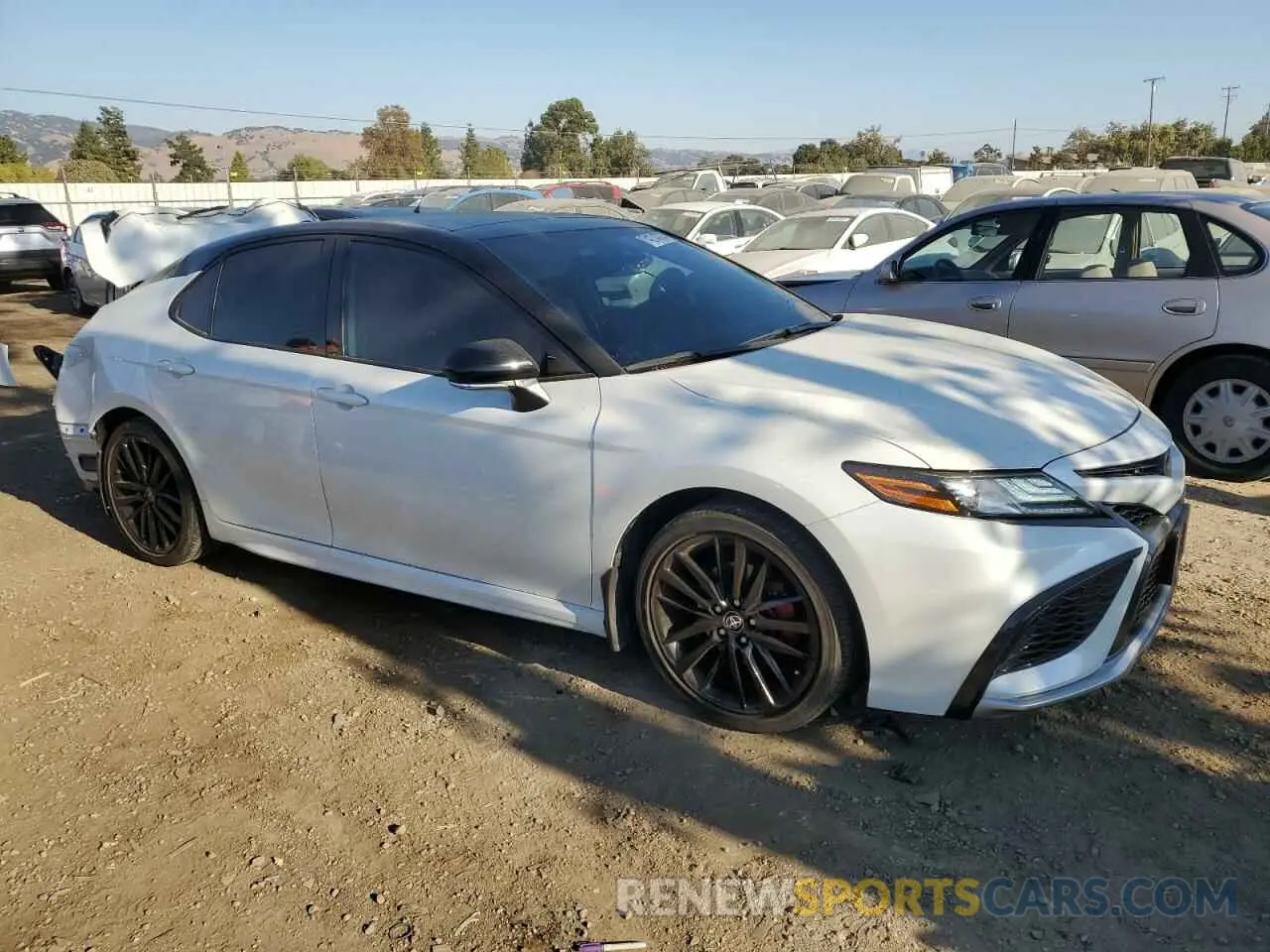 4 Photograph of a damaged car 4T1K61AK0PU103561 TOYOTA CAMRY 2023