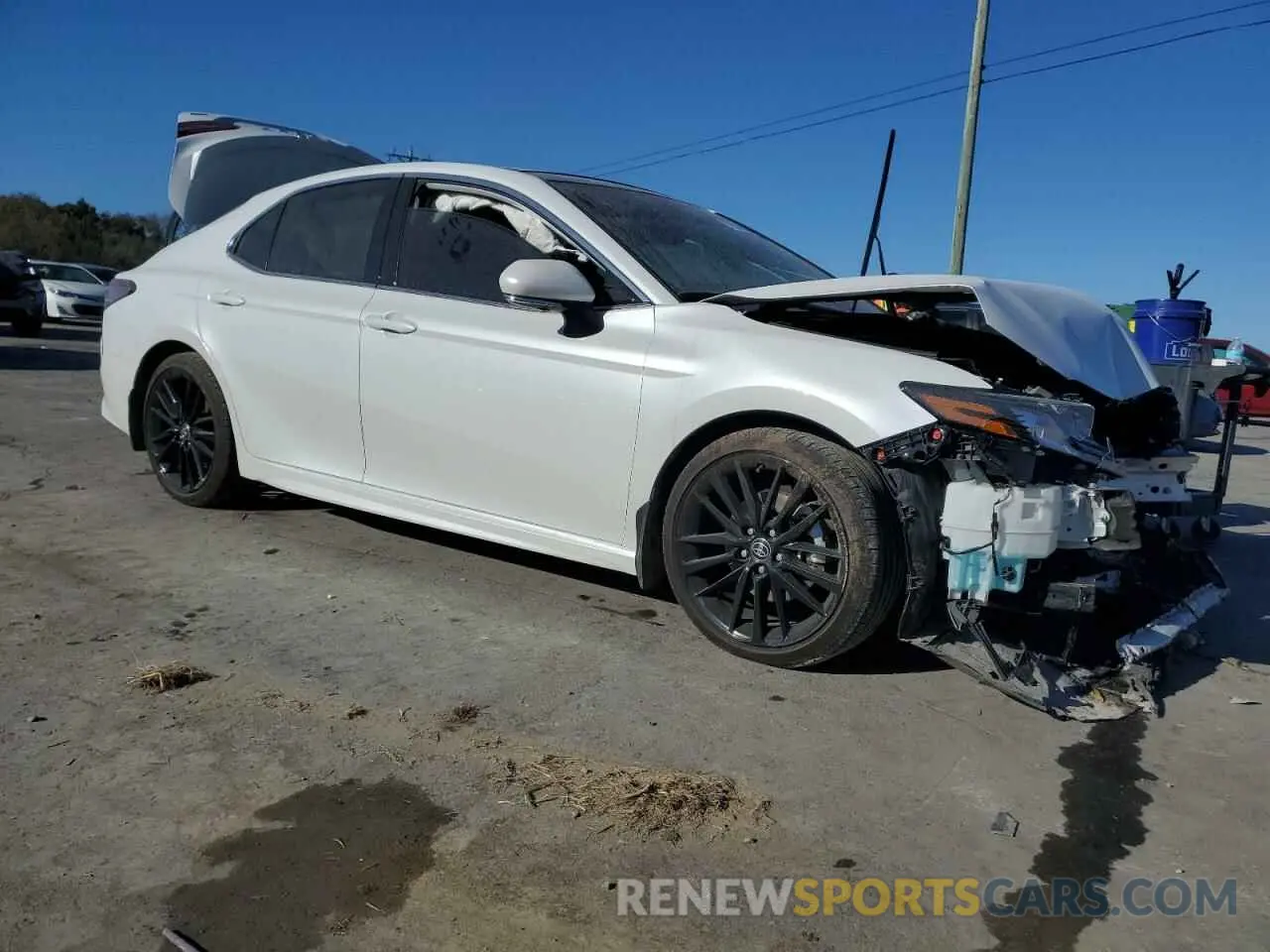 4 Photograph of a damaged car 4T1K61AK0PU757198 TOYOTA CAMRY 2023
