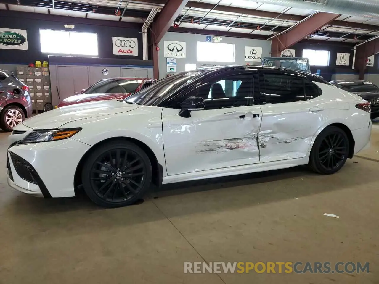 1 Photograph of a damaged car 4T1K61AK4PU121061 TOYOTA CAMRY 2023