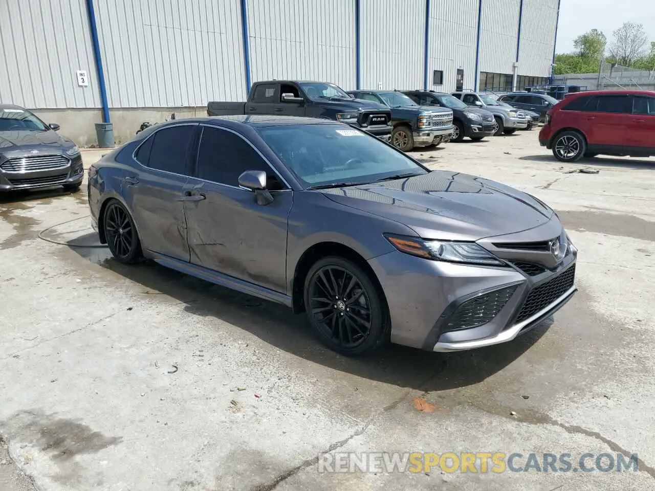 4 Photograph of a damaged car 4T1K61AK6PU839176 TOYOTA CAMRY 2023