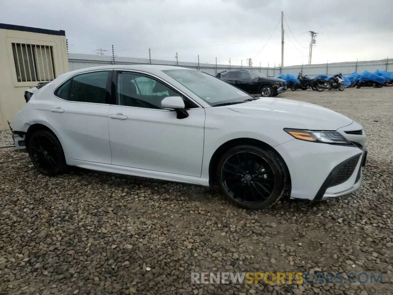 4 Фотография поврежденного автомобиля 4T1K61AK7PU129655 TOYOTA CAMRY 2023
