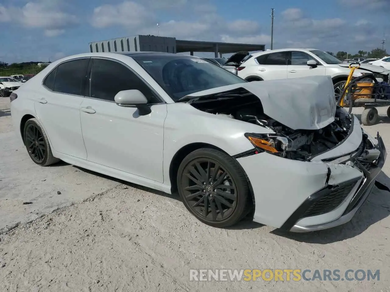 4 Photograph of a damaged car 4T1K61AK9PU165654 TOYOTA CAMRY 2023