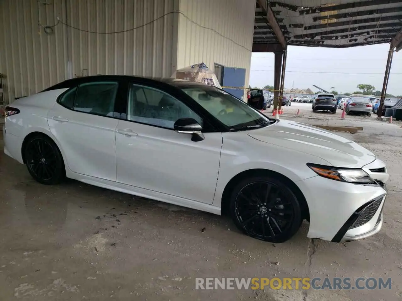 4 Photograph of a damaged car 4T1K61BKXPU084970 TOYOTA CAMRY 2023