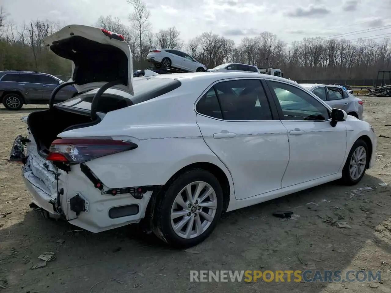 3 Photograph of a damaged car 4T1R11AK0PU819423 TOYOTA CAMRY 2023
