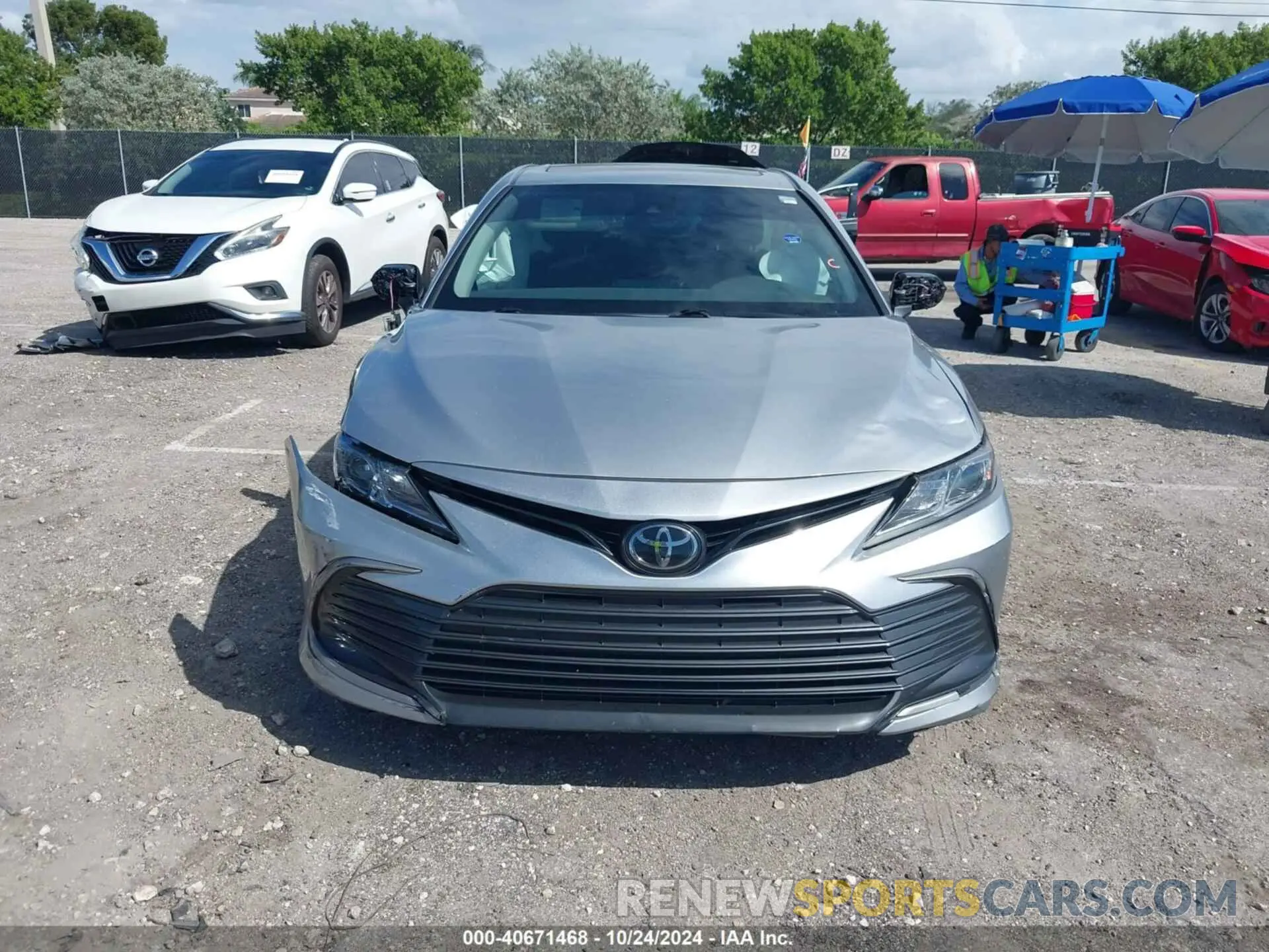 12 Photograph of a damaged car 4T1R11AK4PU102538 TOYOTA CAMRY 2023