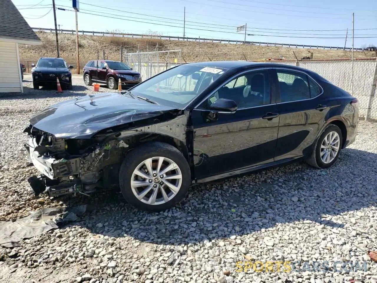 1 Photograph of a damaged car 4T1R11AK4PU812166 TOYOTA CAMRY 2023