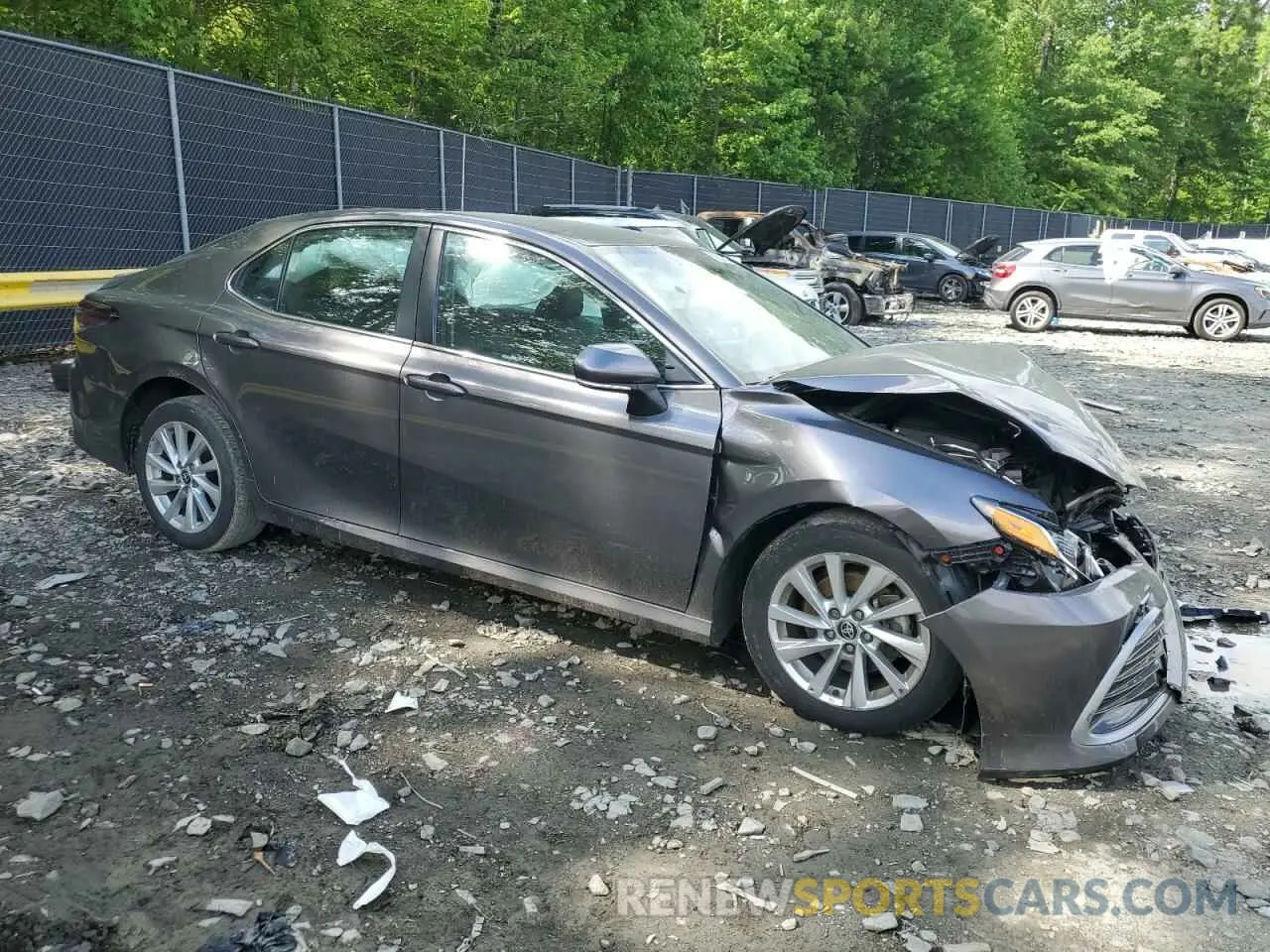 4 Photograph of a damaged car 4T1R11AK6PU129675 TOYOTA CAMRY 2023
