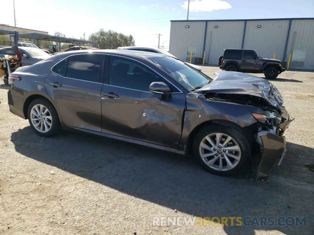 4 Photograph of a damaged car 4T1R11AK8PU756619 TOYOTA CAMRY 2023
