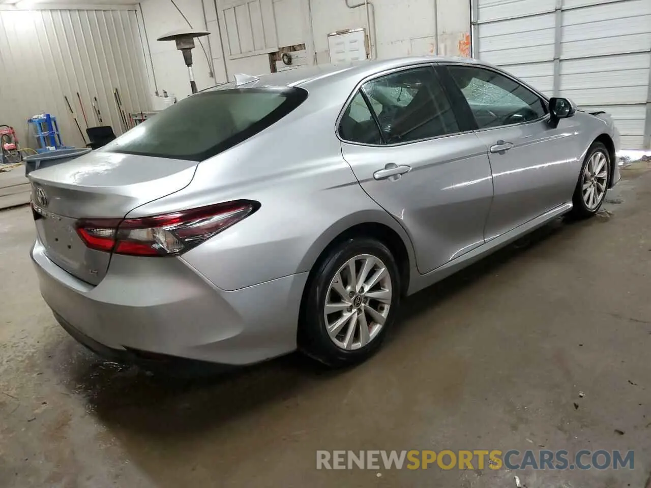 3 Photograph of a damaged car 4T1R11AKXPU782607 TOYOTA CAMRY 2023