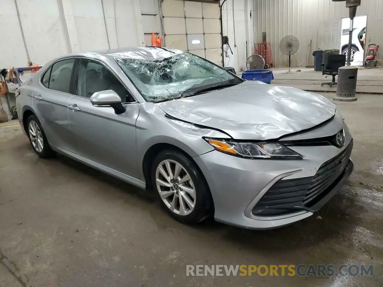 4 Photograph of a damaged car 4T1R11AKXPU782607 TOYOTA CAMRY 2023