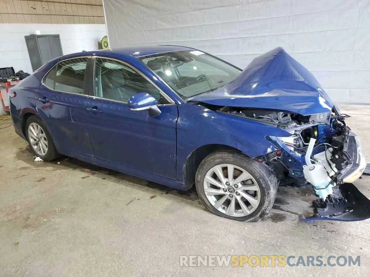 4 Photograph of a damaged car 4T1R11BK9PU100444 TOYOTA CAMRY 2023