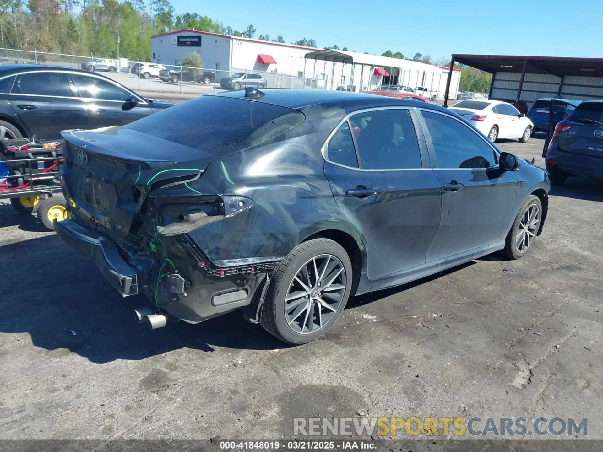 4 Photograph of a damaged car 4T1S11AK1PU138480 TOYOTA CAMRY 2023