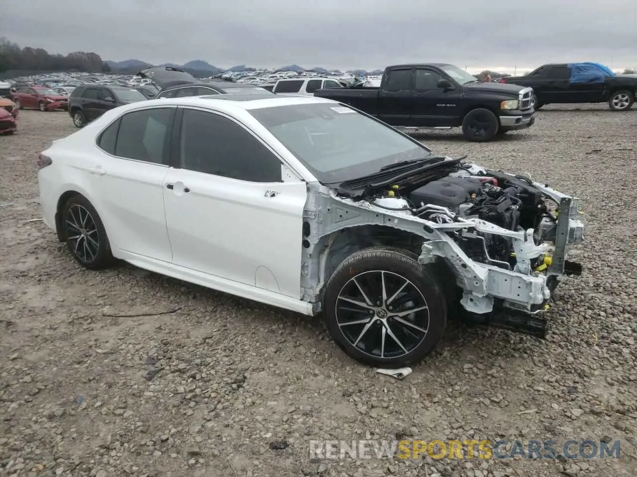 4 Photograph of a damaged car 4T1S11AKXPU799456 TOYOTA CAMRY 2023