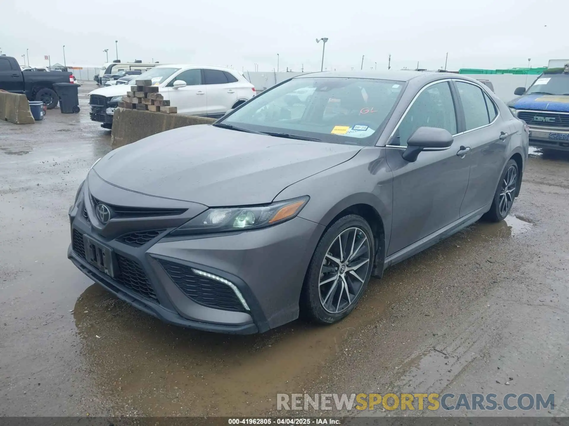 2 Photograph of a damaged car 4T1T11AK0PU084934 TOYOTA CAMRY 2023
