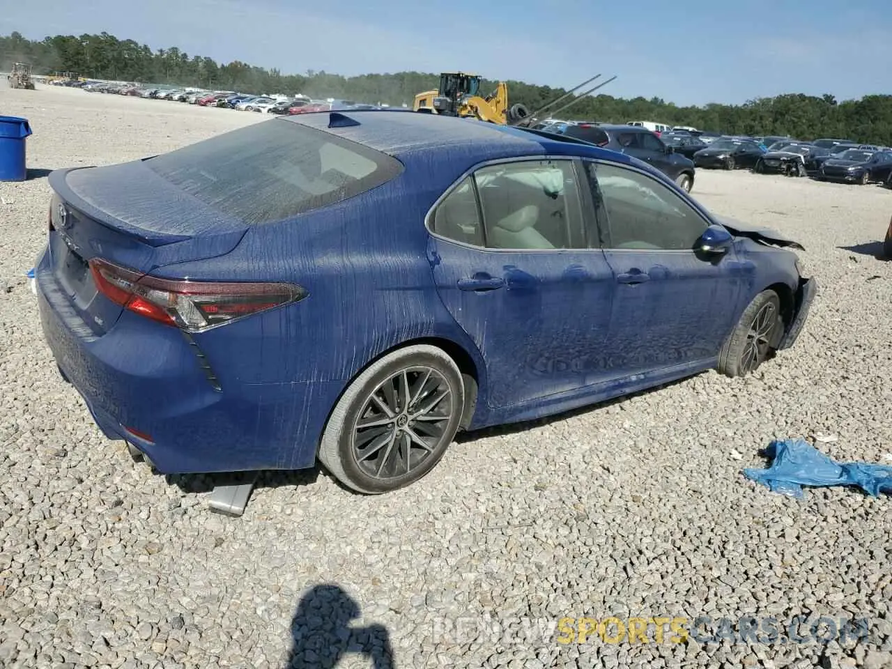 3 Photograph of a damaged car 4T1T11AK0PU173855 TOYOTA CAMRY 2023