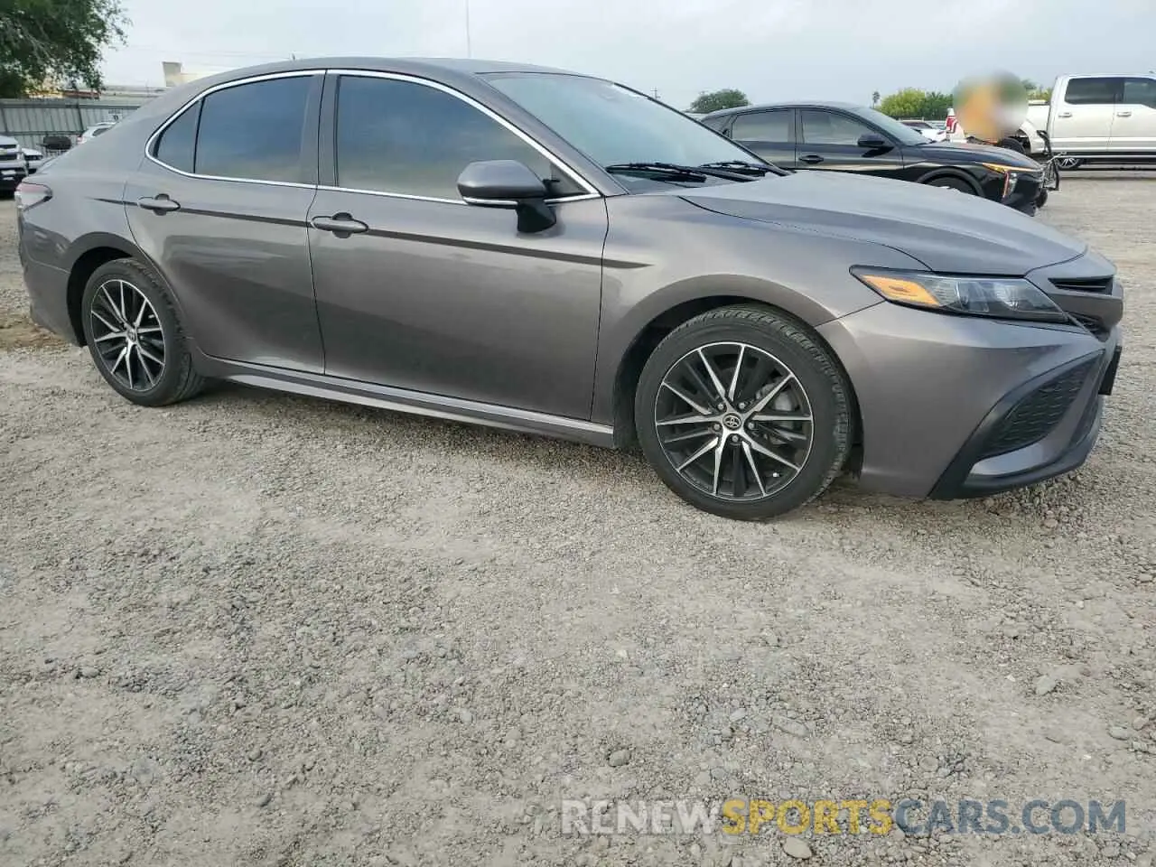4 Photograph of a damaged car 4T1T11AK0PU725113 TOYOTA CAMRY 2023