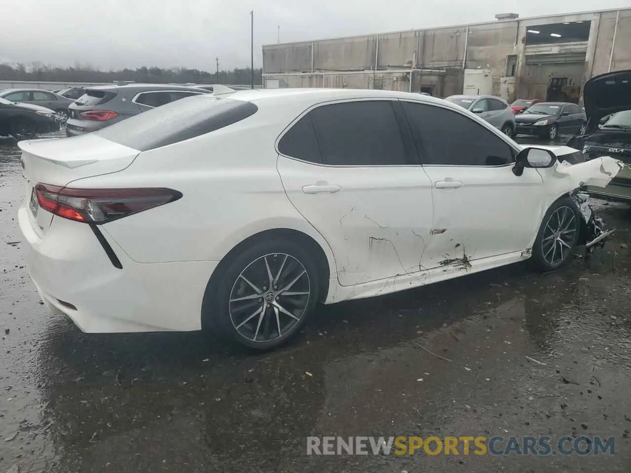 3 Photograph of a damaged car 4T1T11AK1PU835748 TOYOTA CAMRY 2023