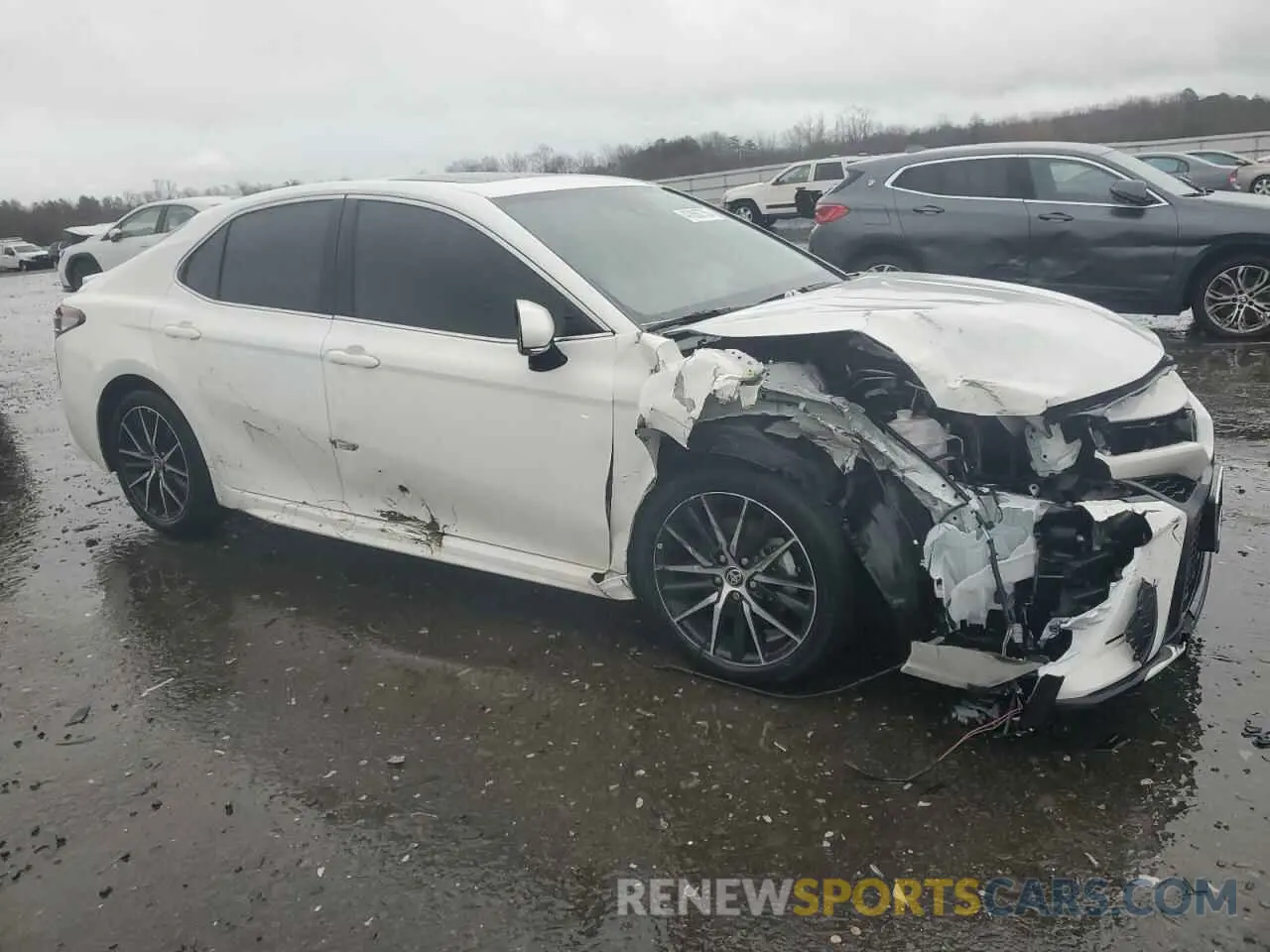 4 Photograph of a damaged car 4T1T11AK1PU835748 TOYOTA CAMRY 2023