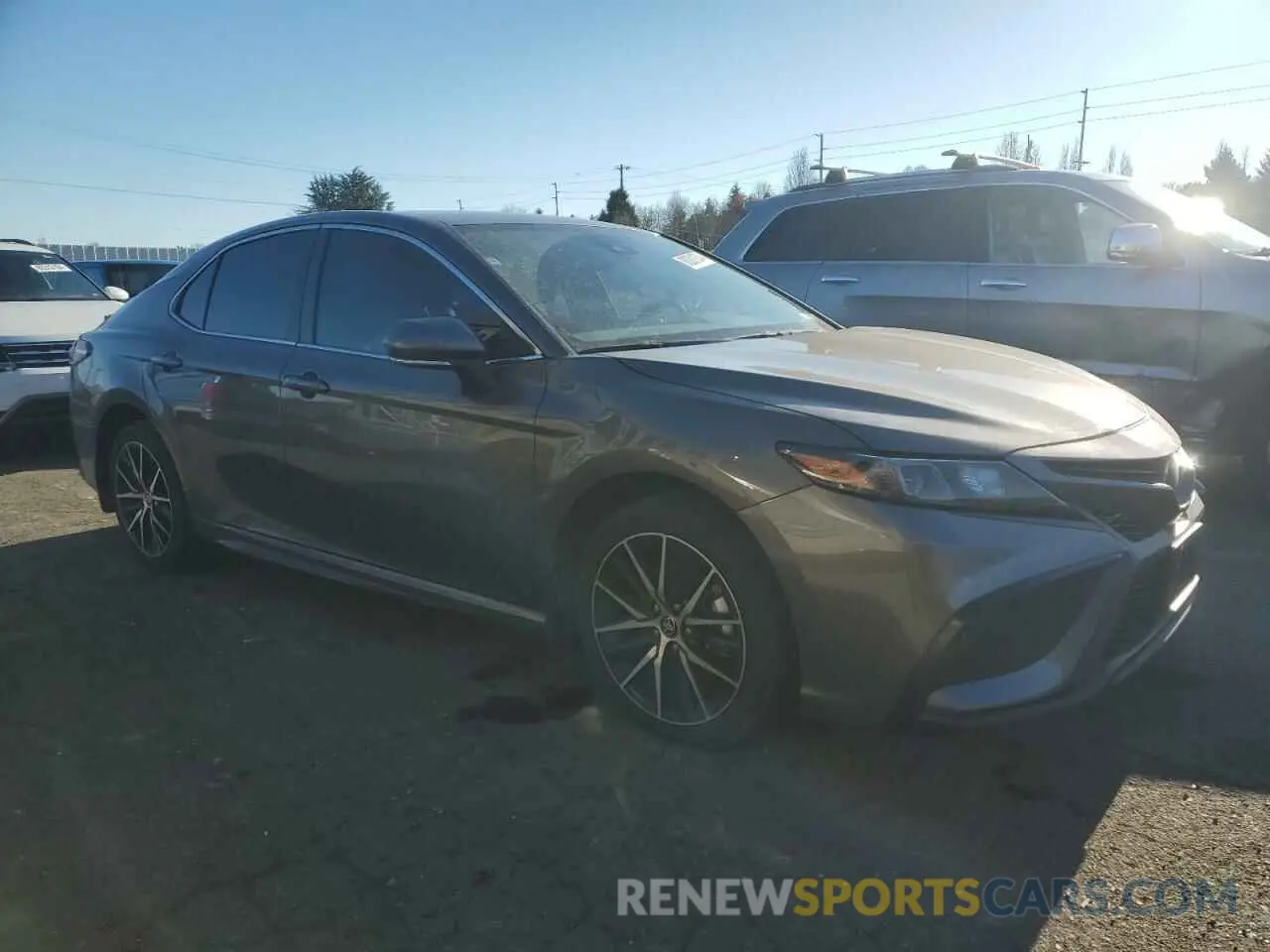 4 Photograph of a damaged car 4T1T11AK2PU783398 TOYOTA CAMRY 2023