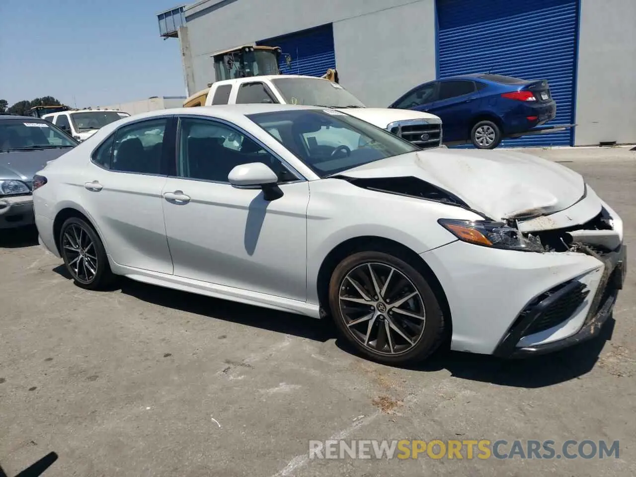 4 Photograph of a damaged car 4T1T11AK3PU104903 TOYOTA CAMRY 2023