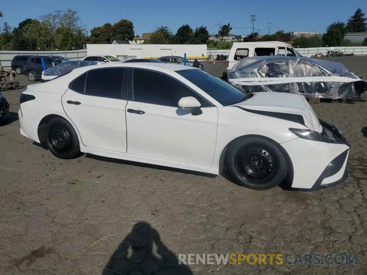 4 Photograph of a damaged car 4T1T11AK3PU777092 TOYOTA CAMRY 2023
