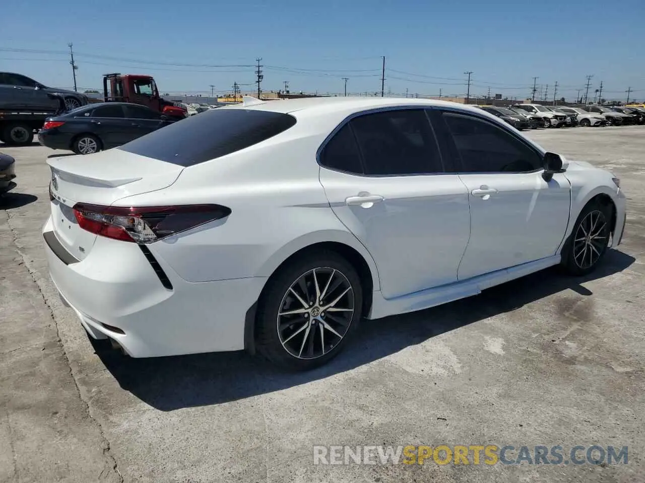 3 Photograph of a damaged car 4T1T11AK4PU767591 TOYOTA CAMRY 2023