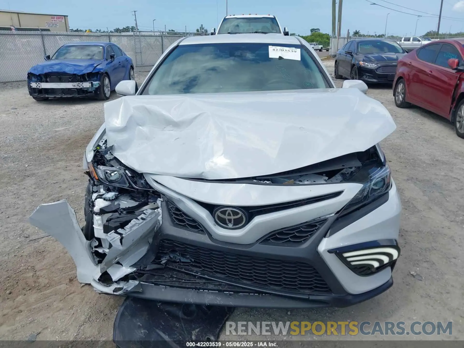 12 Photograph of a damaged car 4T1T11AK6PU143727 TOYOTA CAMRY 2023