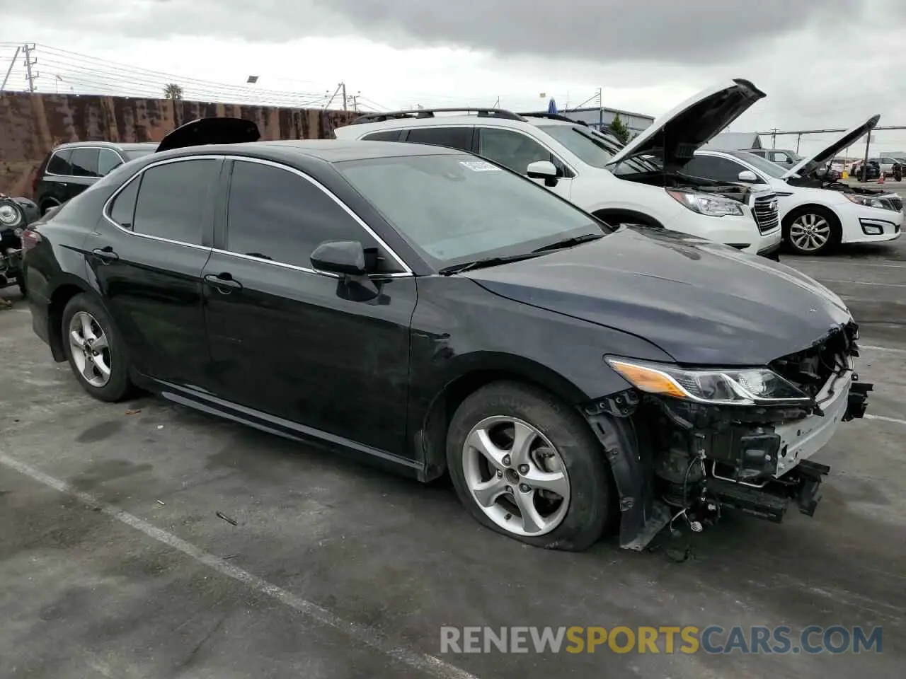 4 Photograph of a damaged car 4T1T11AK6PU730140 TOYOTA CAMRY 2023