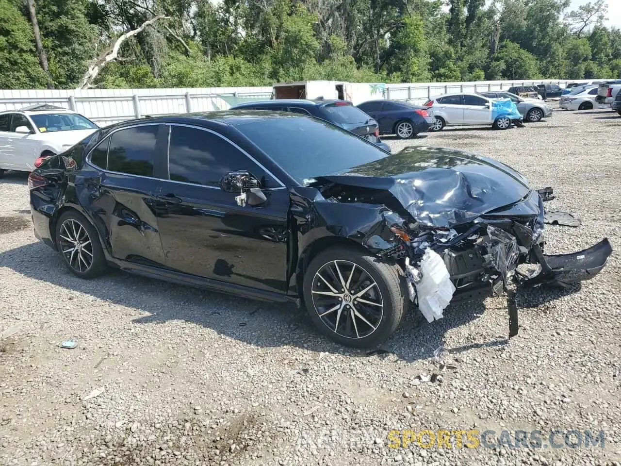 4 Photograph of a damaged car 4T1T11AK7PU823085 TOYOTA CAMRY 2023