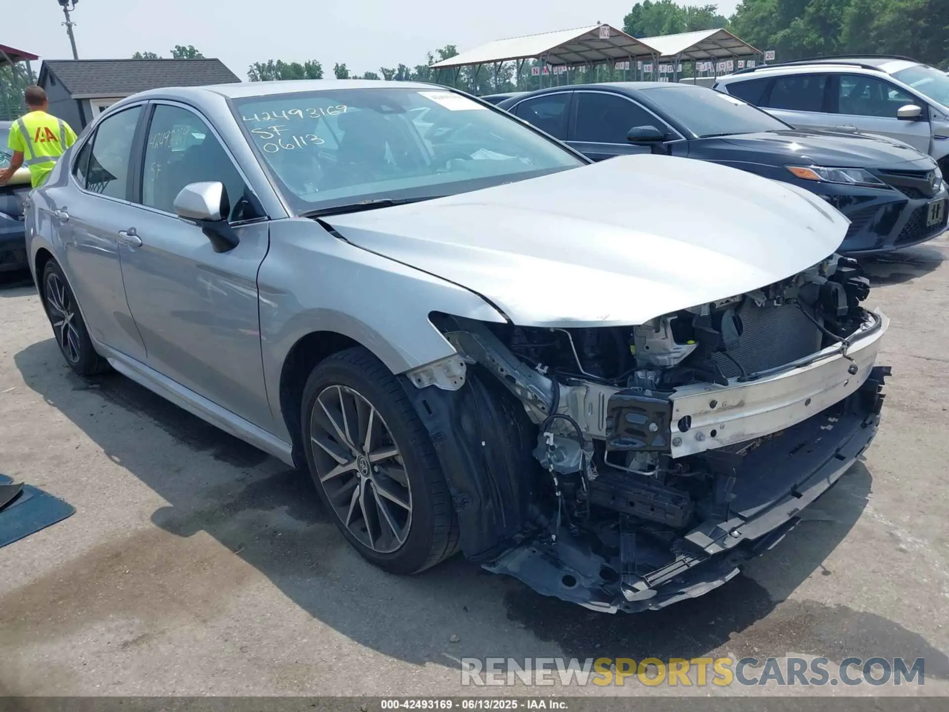 18 Photograph of a damaged car 4T1T11AK8PU171366 TOYOTA CAMRY 2023