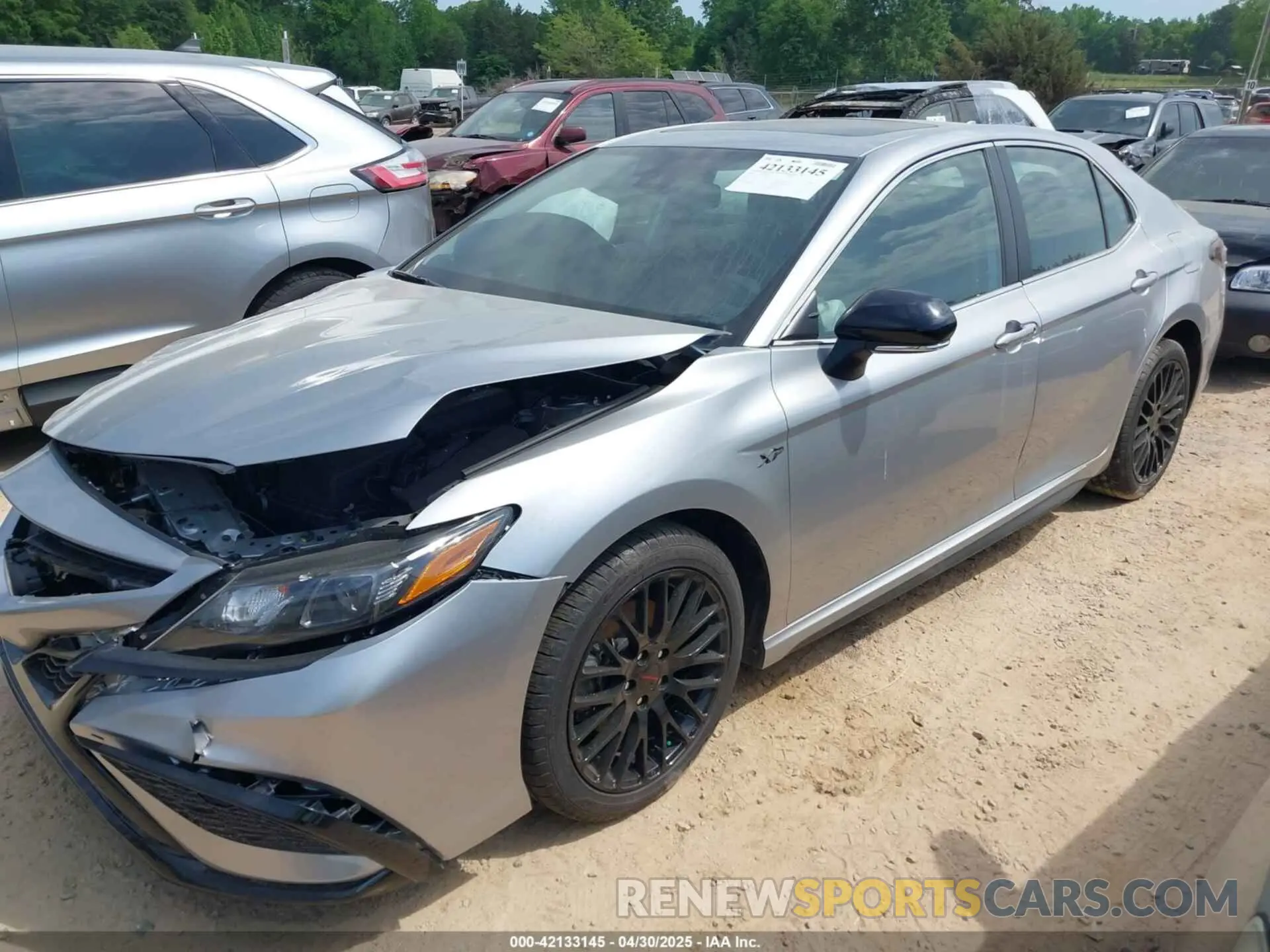 2 Photograph of a damaged car 4T1T11AK9PU759048 TOYOTA CAMRY 2023