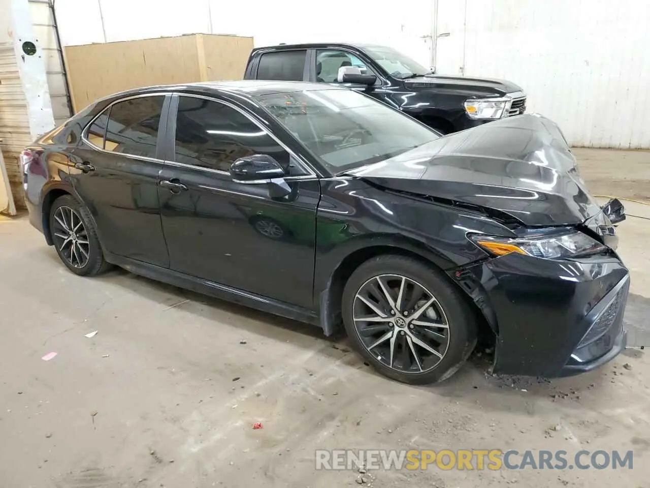 4 Photograph of a damaged car 4T1T11AKXPU779793 TOYOTA CAMRY 2023