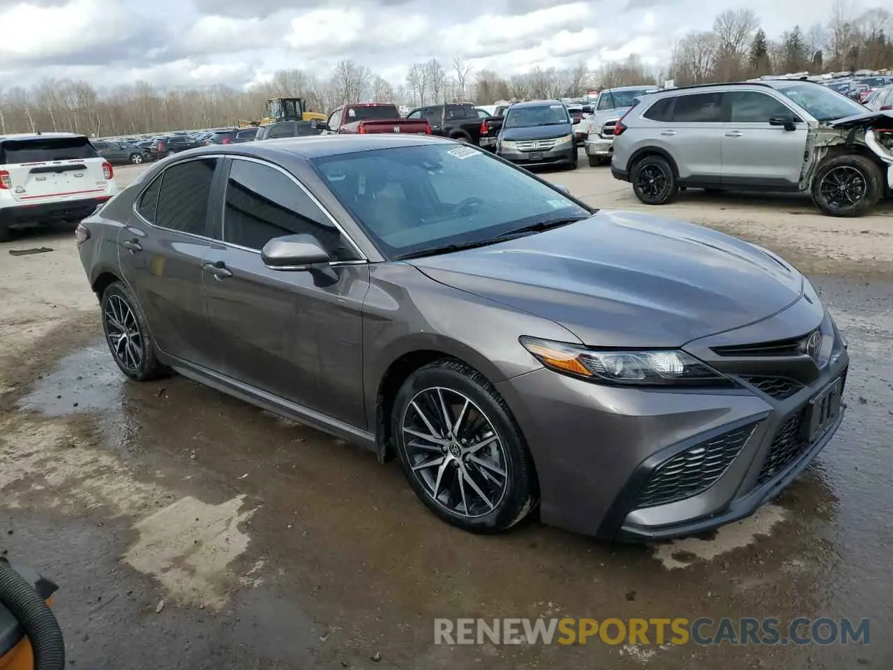 4 Photograph of a damaged car 4T1T11BK7PU102263 TOYOTA CAMRY 2023