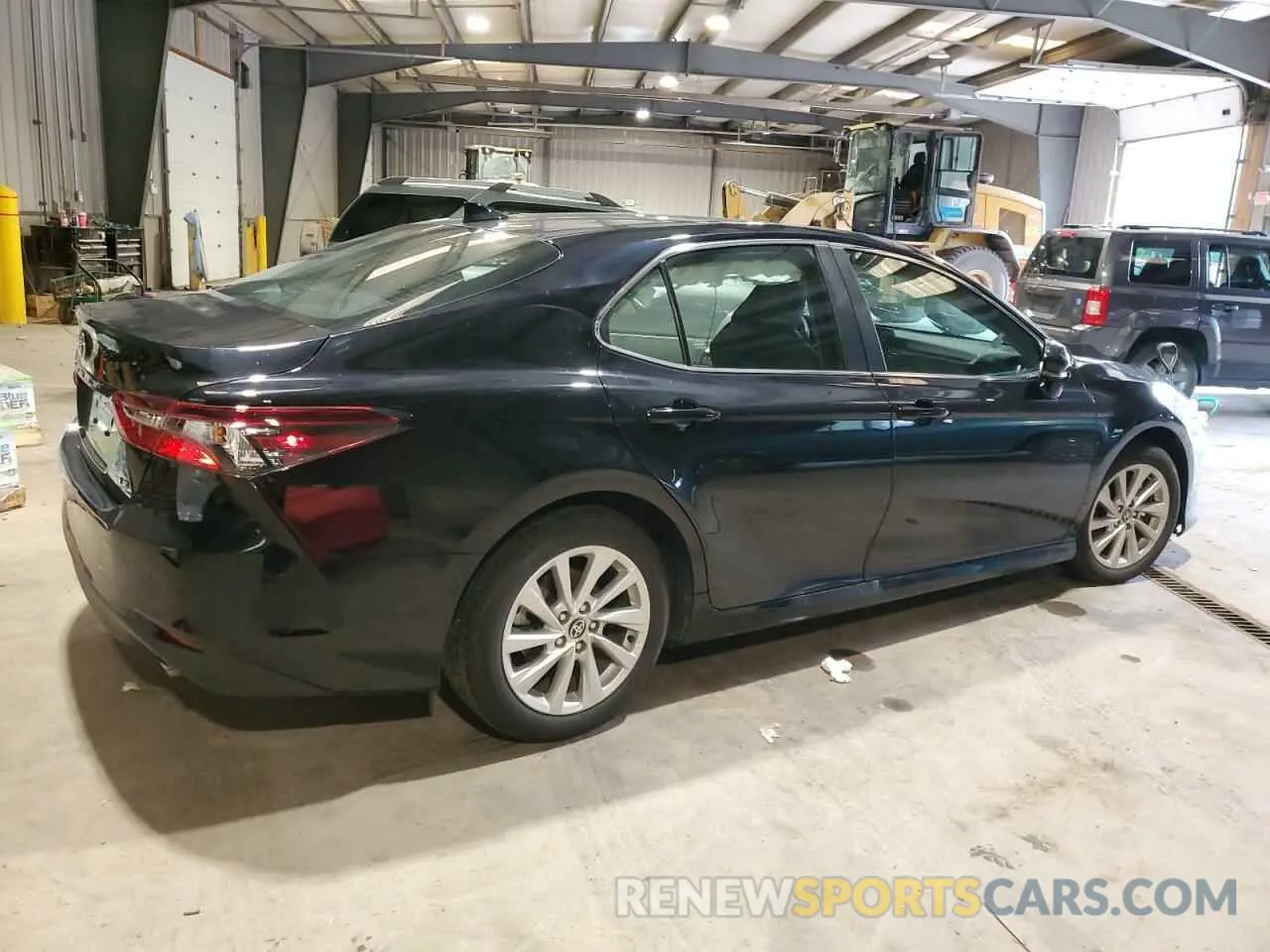 3 Photograph of a damaged car 4T1C11AK3RU858208 TOYOTA CAMRY 2024