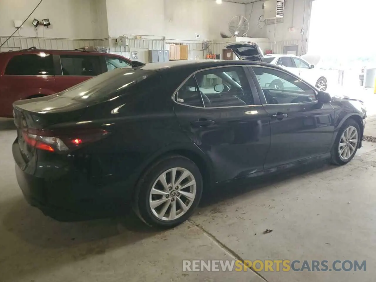 3 Photograph of a damaged car 4T1C11AK4RU858055 TOYOTA CAMRY 2024