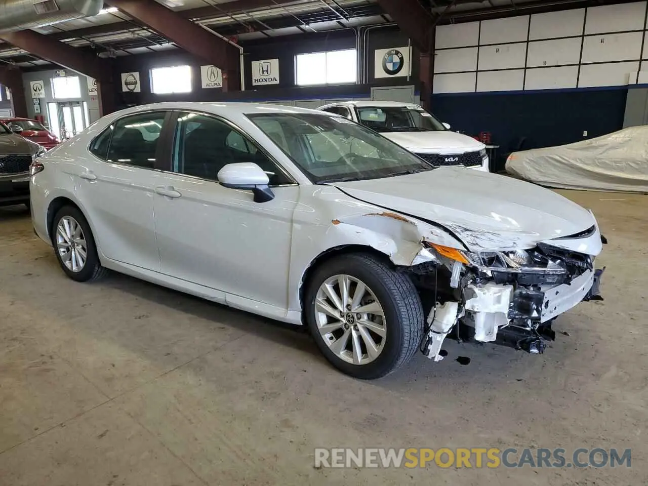 4 Photograph of a damaged car 4T1C11AK7RU228885 TOYOTA CAMRY 2024