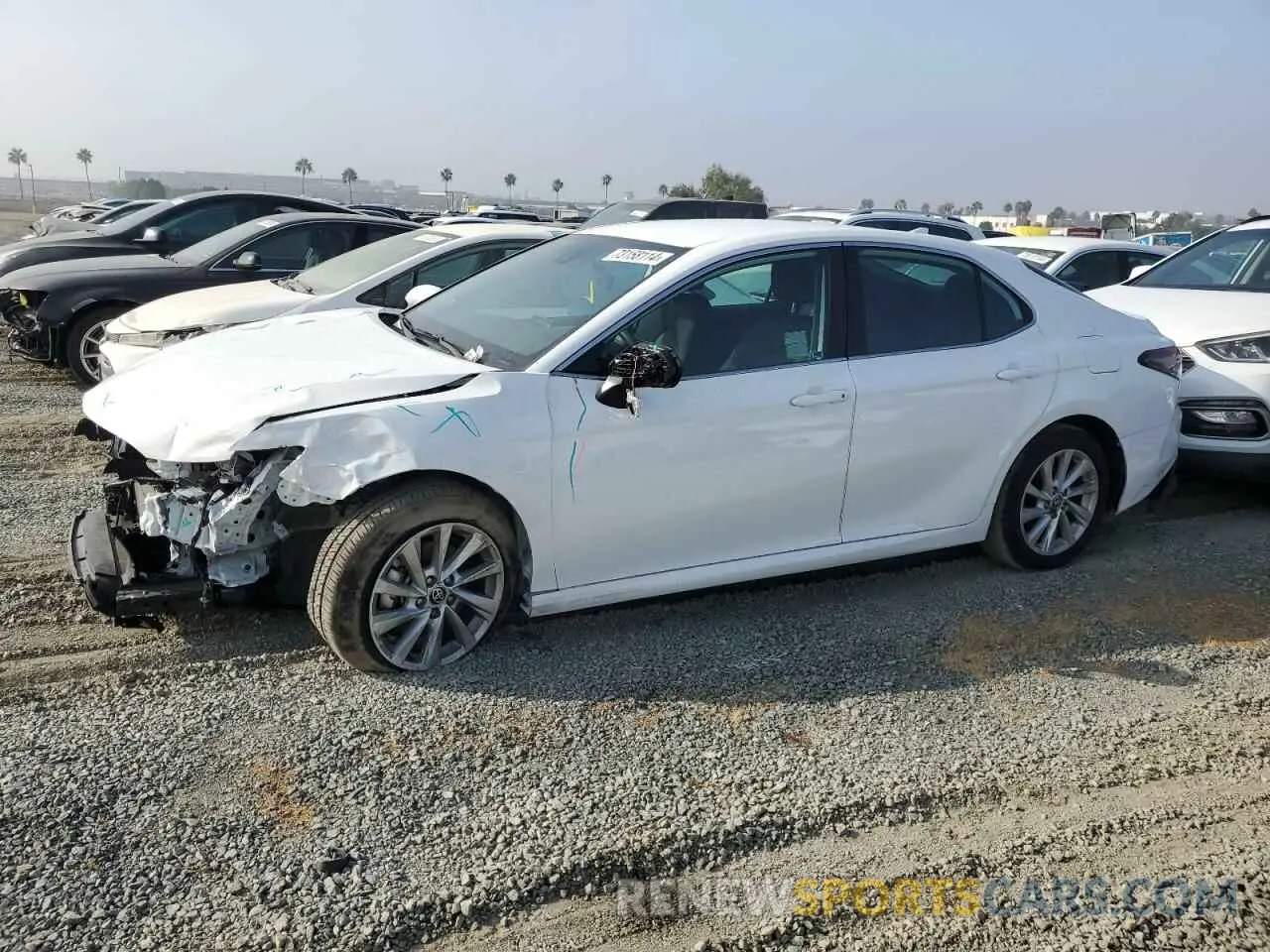 1 Photograph of a damaged car 4T1C11AK8RU869771 TOYOTA CAMRY 2024
