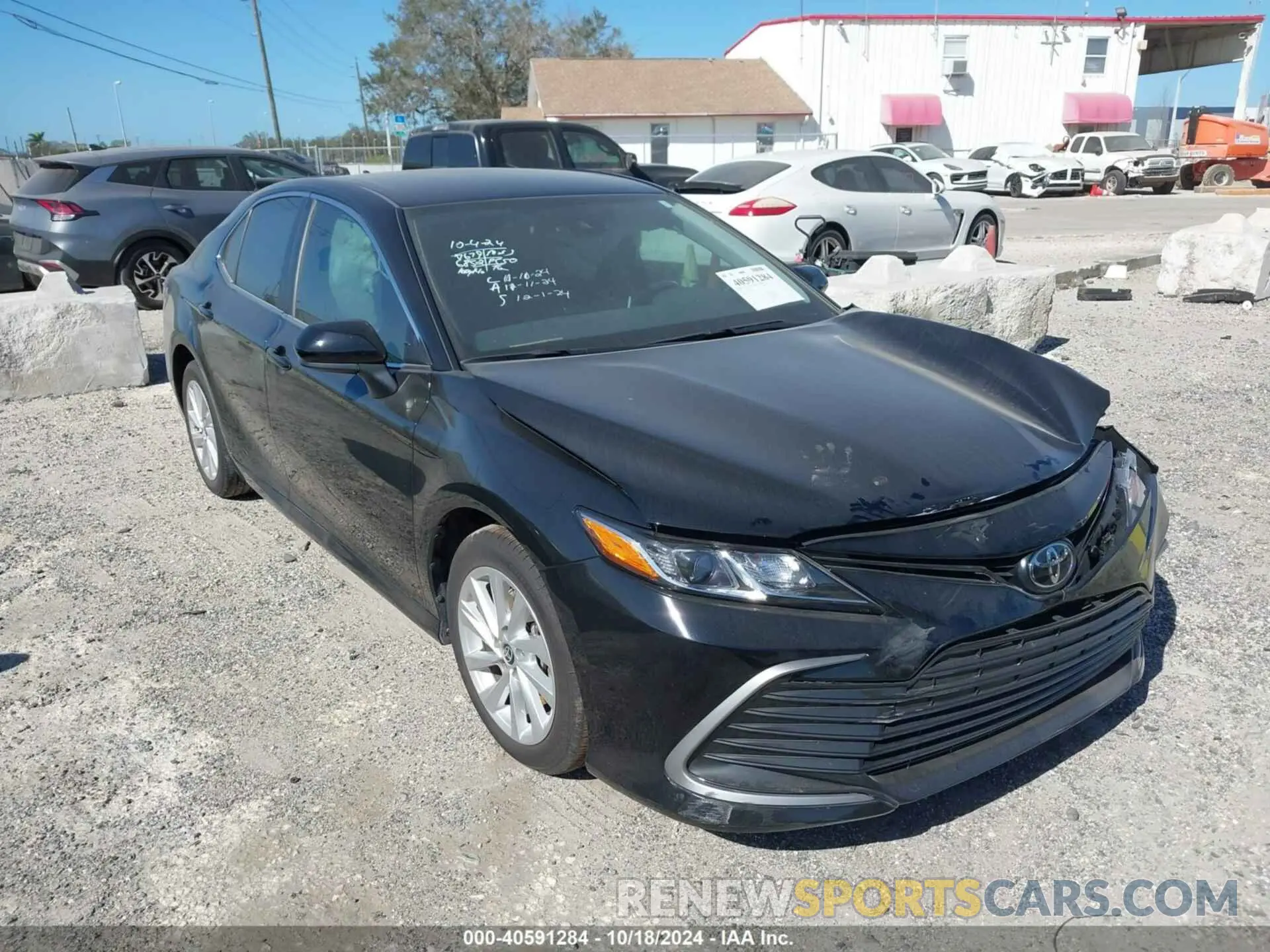 1 Photograph of a damaged car 4T1C11AKXRU236852 TOYOTA CAMRY 2024