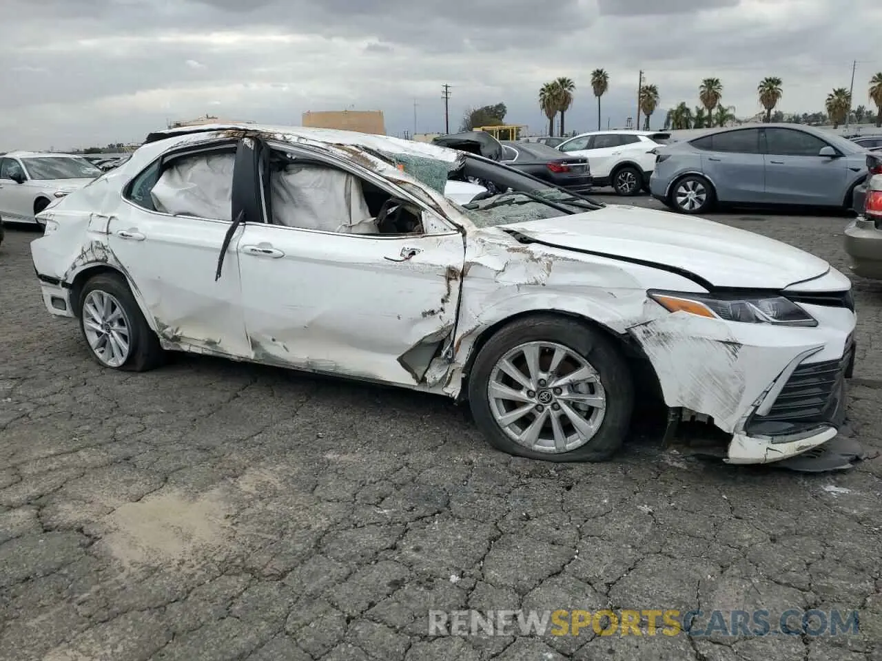 4 Photograph of a damaged car 4T1C11AKXRU899984 TOYOTA CAMRY 2024